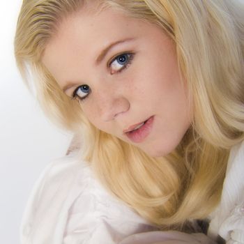 Studio portrait of a blond young lady