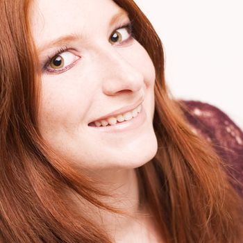 Studio portrait of a natural redhead looking beautiful