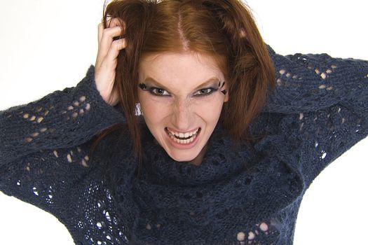Studio portrait of a natural redhead looking crazy
