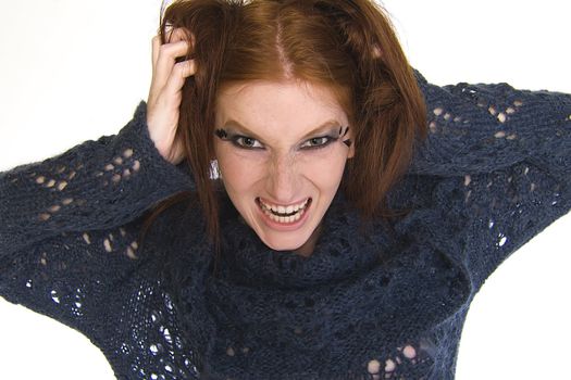 Studio portrait of a natural redhead looking crazy