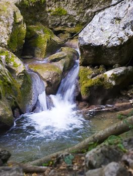 Mountain small river.A fragment of the mountain river running among stones