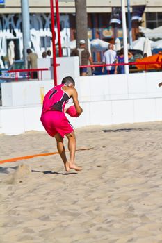 CADIZ, SPAIN - JULY 19: Unidentified players compete in a match between Autoescuela Barquin and CadizSur Seguros BMPY in the 19th league of beach handball of Cadiz on July 19, 2011 in Cadiz, Spain