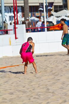 CADIZ, SPAIN - JULY 19: Unidentified players compete in a match between Autoescuela Barquin and CadizSur Seguros BMPY in the 19th league of beach handball of Cadiz on July 19, 2011 in Cadiz, Spain