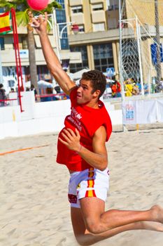 CADIZ, SPAIN - JULY 19: Unidentified players compete in a match between Autoescuela Barquin and CadizSur Seguros BMPY in the 19th league of beach handball of Cadiz on July 19, 2011 in Cadiz, Spain