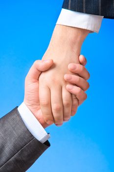 Closeup of a handshake between two business men