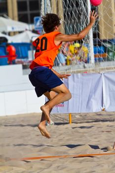 CADIZ, SPAIN - JULY 19: Unidentified players compete in a match between Autoescuela Barquin and CadizSur Seguros BMPY in the 19th league of beach handball of Cadiz on July 19, 2011 in Cadiz, Spain