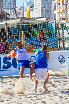 CADIZ, SPAIN - JULY 19: Unidentified players compete in a match between Valcarcel Recuperado and DecoHogar in the 19th league of beach handball of Cadiz on July 19, 2011 in Cadiz, Spain