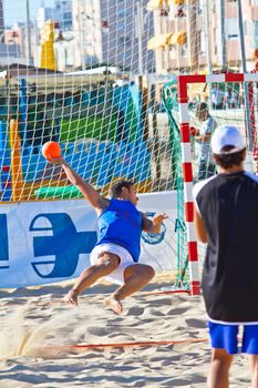 CADIZ, SPAIN - JULY 19: Unidentified players compete in a match between Valcarcel Recuperado and DecoHogar in the 19th league of beach handball of Cadiz on July 19, 2011 in Cadiz, Spain