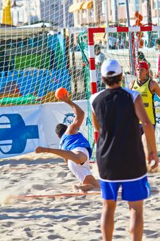 CADIZ, SPAIN - JULY 19: Unidentified players compete in a match between Valcarcel Recuperado and DecoHogar in the 19th league of beach handball of Cadiz on July 19, 2011 in Cadiz, Spain