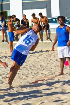 CADIZ, SPAIN - JULY 19: Unidentified players compete in a match between Valcarcel Recuperado and DecoHogar in the 19th league of beach handball of Cadiz on July 19, 2011 in Cadiz, Spain