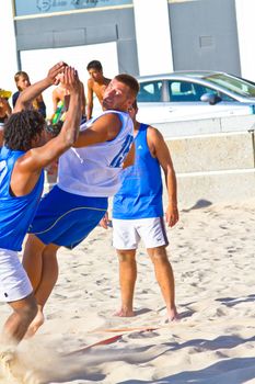 CADIZ, SPAIN - JULY 19: Unidentified players compete in a match between Valcarcel Recuperado and DecoHogar in the 19th league of beach handball of Cadiz on July 19, 2011 in Cadiz, Spain