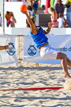 CADIZ, SPAIN - JULY 19: Unidentified players compete in a match between Valcarcel Recuperado and DecoHogar in the 19th league of beach handball of Cadiz on July 19, 2011 in Cadiz, Spain