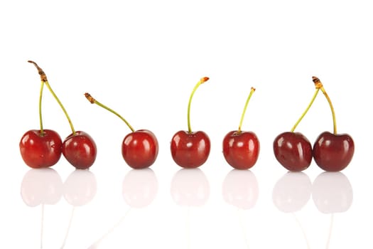 Sweet red cherries isolated on a white background