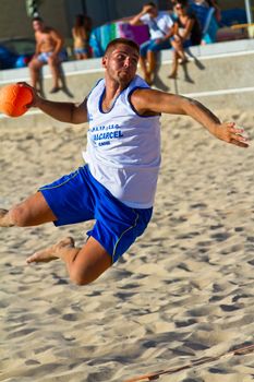 CADIZ, SPAIN - JULY 19: Unidentified players compete in a match between Valcarcel Recuperado and DecoHogar in the 19th league of beach handball of Cadiz on July 19, 2011 in Cadiz, Spain