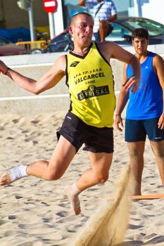 CADIZ, SPAIN - JULY 19: Unidentified players compete in a match between Valcarcel Recuperado and DecoHogar in the 19th league of beach handball of Cadiz on July 19, 2011 in Cadiz, Spain