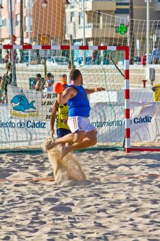 CADIZ, SPAIN - JULY 19: Unidentified players compete in a match between Valcarcel Recuperado and DecoHogar in the 19th league of beach handball of Cadiz on July 19, 2011 in Cadiz, Spain