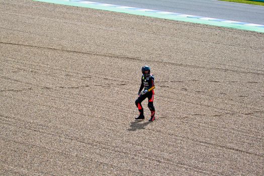 JEREZ DE LA FRONTERA, SPAIN-MAR 5: 125cc motorcyclist Daniel Kartheininge after an accident on the official training of the world championship of MotoGP on March 5, 2011 in Jerez de la Frontera, Spain