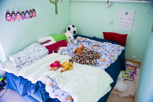 Children bed and toys in tte children room