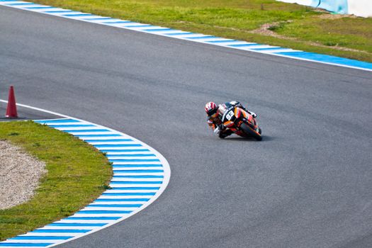 JEREZ DE LA FRONTERA, SPAIN - MAR 5: Moto2 motorcyclist Marc Marquez takes a curve in the MotoGP Official Trainnig on Mar 5, 2011 in Jerez de la Frontera, Spain