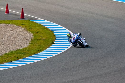JEREZ DE LA FRONTERA, SPAIN - MAR 5:125cc pilot Sergio Gadea races on the official training of the world championship of MotoGP on Mar 5, 2011, in racetrack of velocity of Jerez de la Frontera, Spain