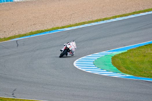JEREZ DE LA FRONTERA, SPAIN - MAR 5: 125cc motorcyclist Louis Rossi races on the official training of the world championship of MotoGP on March 5, 2011 in Jerez de la Frontera, Spain