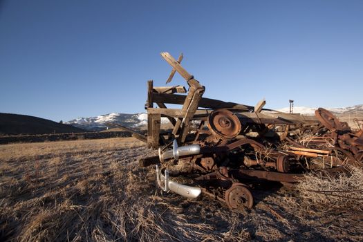 An old abandoned vintage delivery truck van in a field