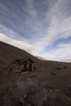 A old abandoned cabin in the desert. scenic house travel shack solitude