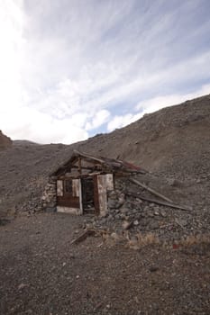 A old abandoned cabin in the desert. scenic house travel shack solitude