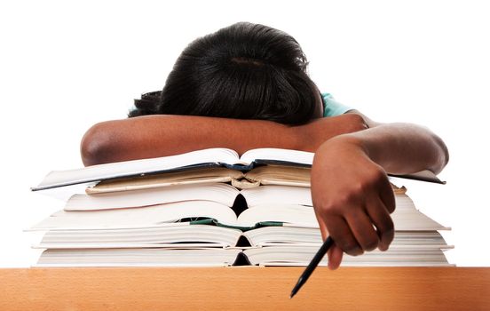 Student tired of doing homework studying with pen asleep on open books, isolated.