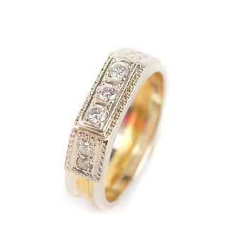 gold ring with big blue gem and smaller diamonds