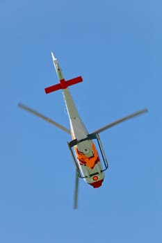 CADIZ, SPAIN-SEP 12: Helicopters of the Patrulla Aspa taking part in an exhibition on the 3rd airshow of Cadiz on Sep 12, 2010, in Cadiz, Spain