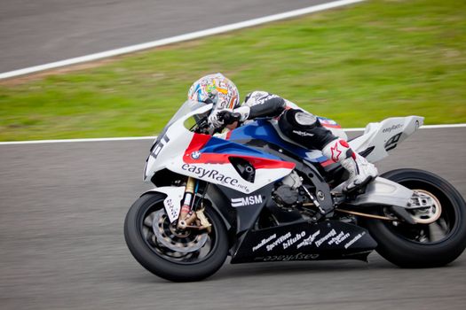 JEREZ DE LA FRONTERA, SPAIN - NOV 20: Stock Extreme motorcyclist Eduardo Salvador races in the CEV championship on Nov 20, 2010, in Jerez de la Frontera, Spain