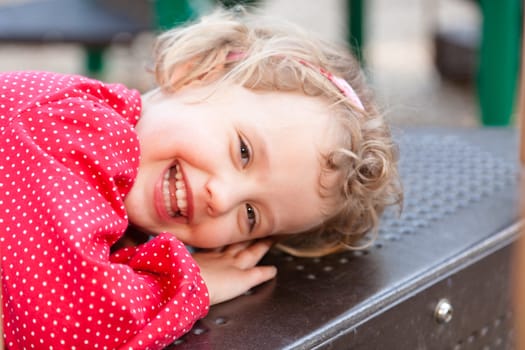 Having fun at playground in the park on Sunday afternoon.