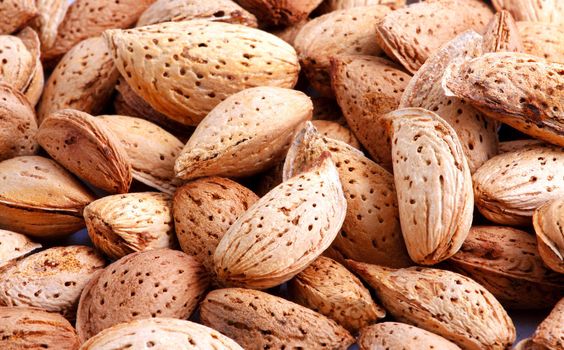 Almonds on white background