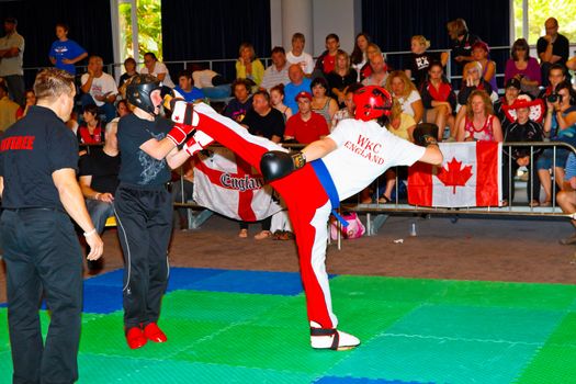 CHICLANA DE LA FRONTERA, SPAIN-NOV 05: Unidentified players compete in the 3rd World Karate and Kickboxing Council championship  on Nov 05, 2011, in Chiclana de la Frontera,  Spain