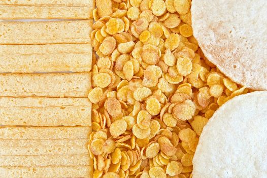 The texture of corn flakes, round and rectangular dry breads