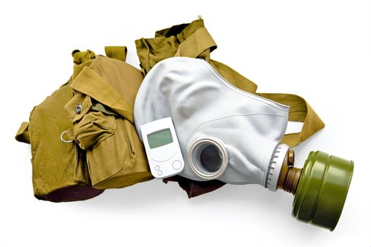 Gas mask, a green bag and a radiometer is isolated on a white background