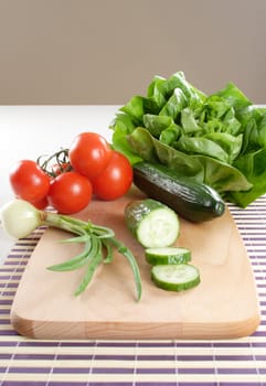 Fresh vegetables on the board to cutting 