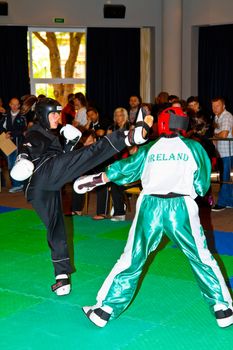 CHICLANA DE LA FRONTERA, SPAIN-NOV 05: Unidentified players compete in the 3rd World Karate and Kickboxing Council championship  on Nov 05, 2011, in Chiclana de la Frontera,  Spain