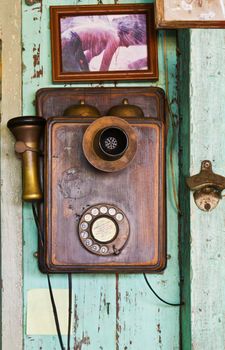 An old telephone  vintage on old wall