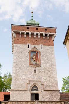 Florian Gate in Kraków , Poland , is one of the best-known Polish Gothic towers