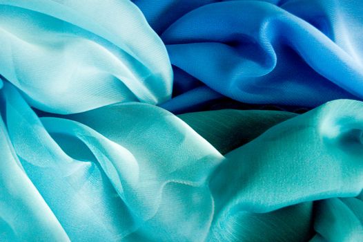 Blue tones of silk fabric folded