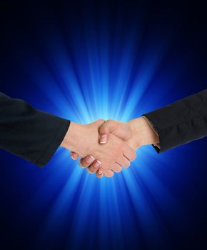 Handshake Handshaking and blured blue flesh light in background
