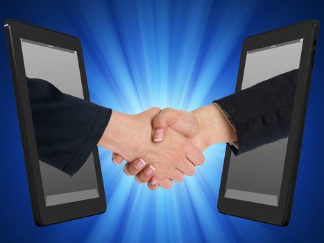 Two Computer Device and Hands in handshaking, Incernet Working Concept, Wireless Communication, Online Business