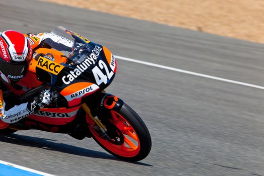 JEREZ DE LA FRONTERA, SPAIN - APR 17: 125cc motorcyclist Alex Rins takes a curve in the CEV Championship race on April 17, 2011 in Jerez de la Frontera, Spain.