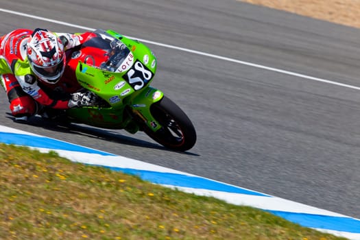 JEREZ DE LA FRONTERA, SPAIN - APR 17: 125cc motorcyclist Juanfran Guevara takes a curve in the CEV Championship race on April 17, 2011 in Jerez de la Frontera, Spain.