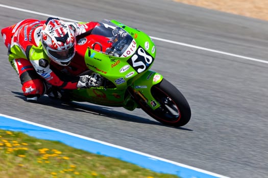 JEREZ DE LA FRONTERA, SPAIN - APR 17: 125cc motorcyclist Juanfran Guevara takes a curve in the CEV Championship race on April 17, 2011 in Jerez de la Frontera, Spain.