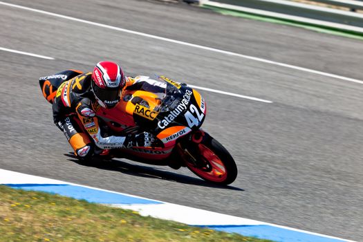 JEREZ DE LA FRONTERA, SPAIN - APR 17: 125cc motorcyclist Alex Rins takes a curve in the CEV Championship race on April 17, 2011 in Jerez de la Frontera, Spain.