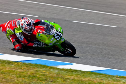 JEREZ DE LA FRONTERA, SPAIN - APR 17: 125cc motorcyclist Juanfran Guevara takes a curve in the CEV Championship race on April 17, 2011 in Jerez de la Frontera, Spain.