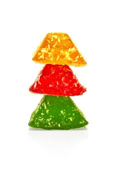 Three marmalade of red, green and yellow, folded on each other is isolated on a white background